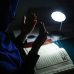 Woman reading Quran | Aisha Moallin