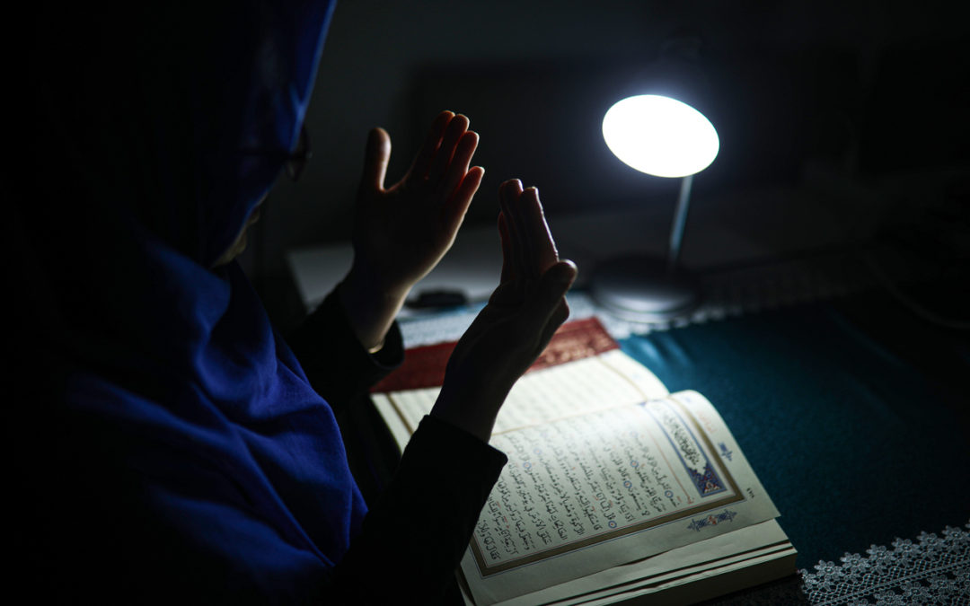 Woman reading Quran | Aisha Moallin